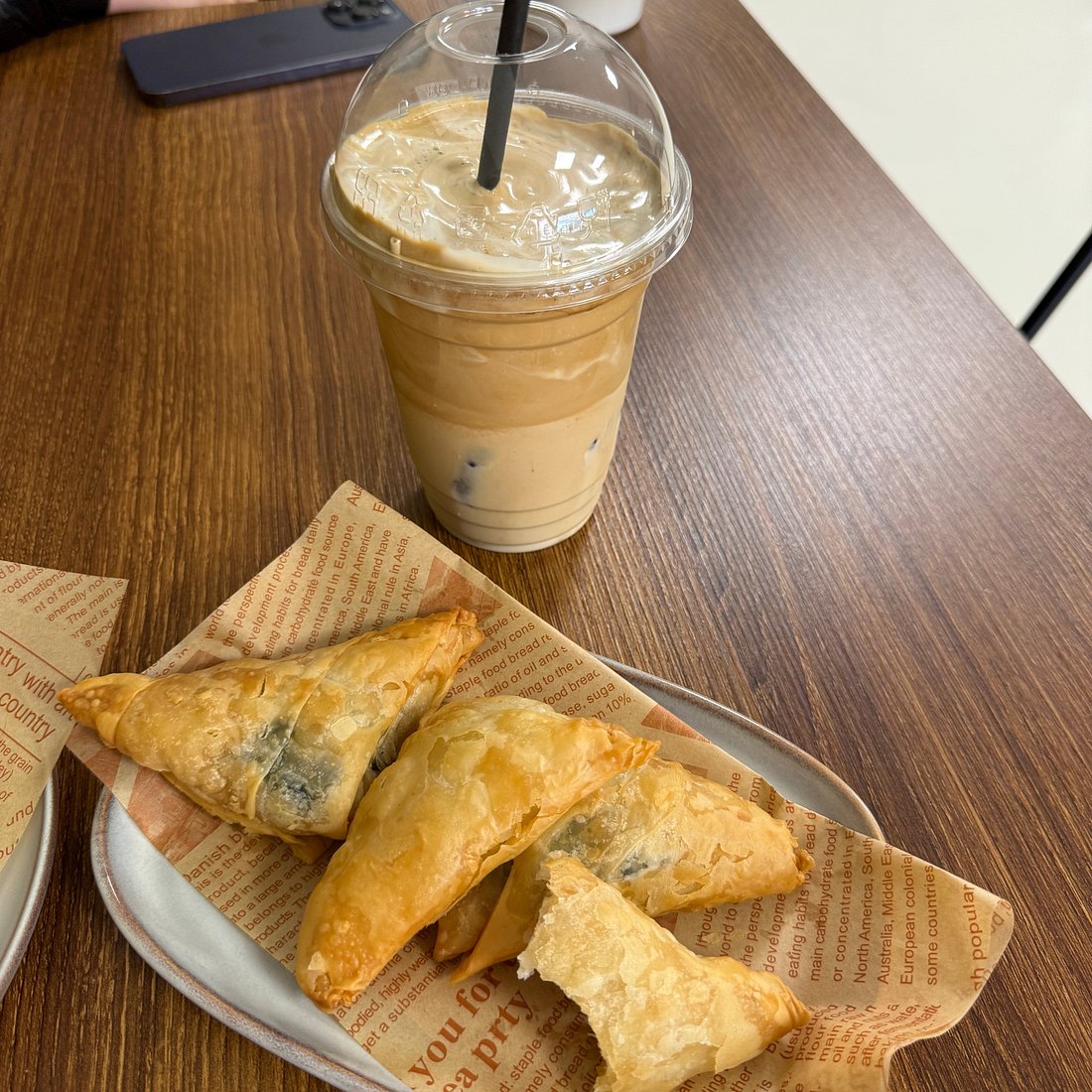 Golden pastries and a cold drink photographed at The Greek Spot, Middlesbrough